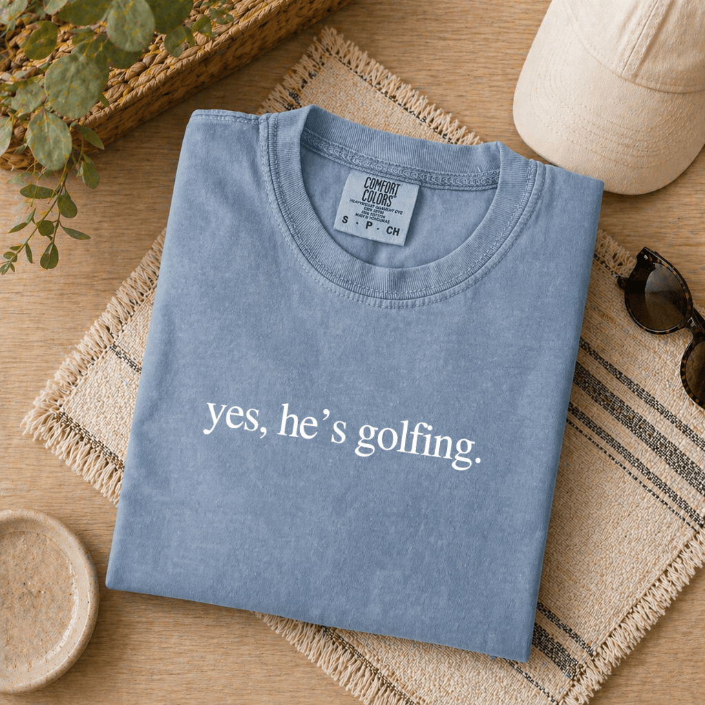He's Golfing Comfort Colors T-Shirt - Funny Gift for Golfer Wife, Golf Season - detail view